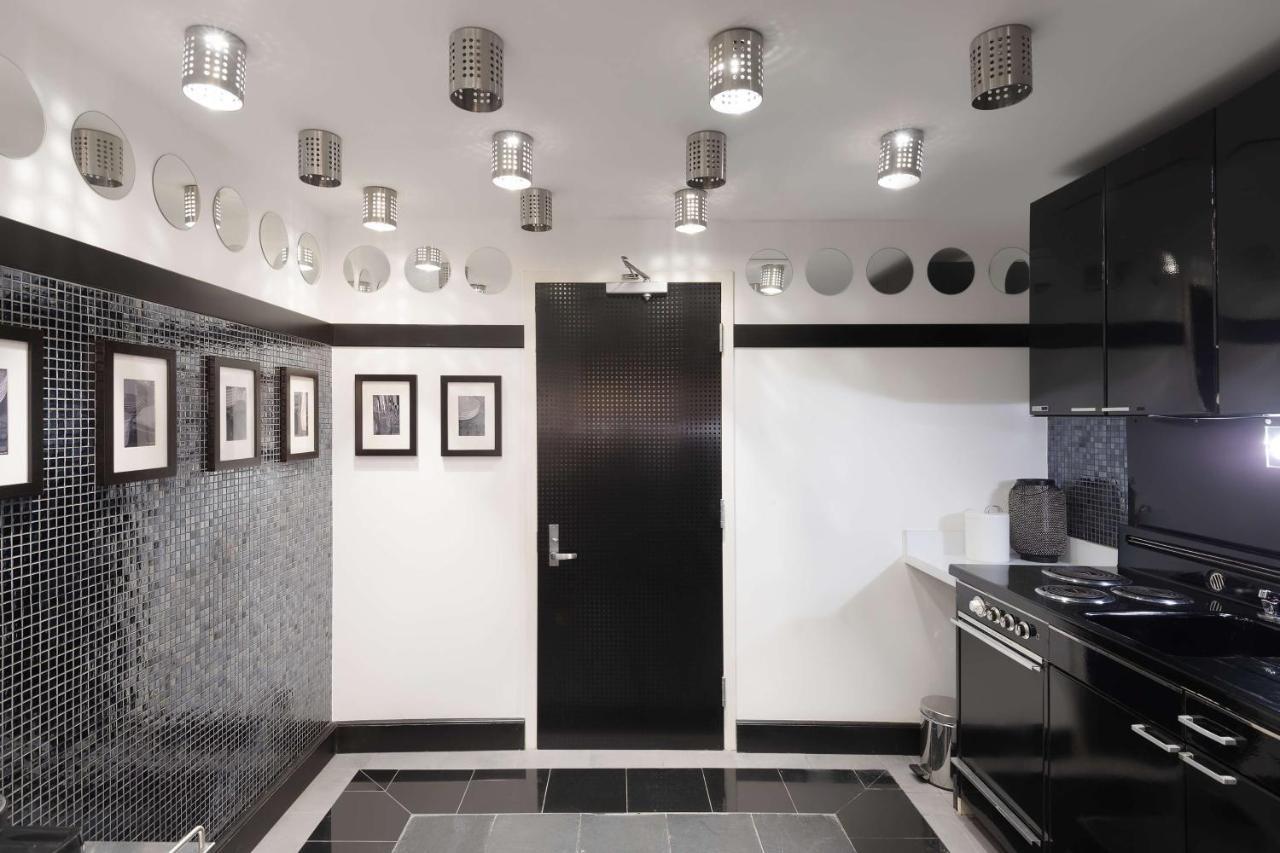 Radisson Blu Resort, Sharjah Luaran gambar A kitchen with a concealed door